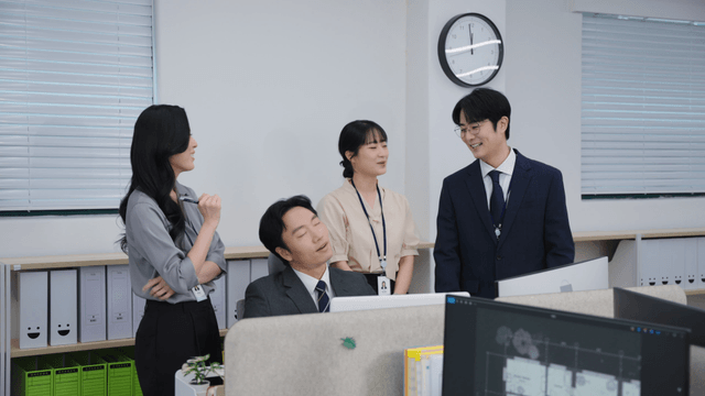 Office workers discussing a project