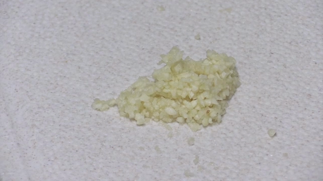 Chopped garlic on a cutting board