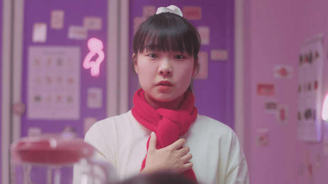 Girl talking while looking down from a fancy room