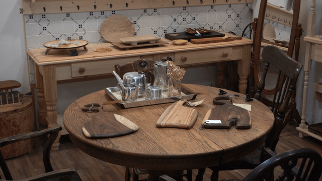 Cozy kitchen with wooden table and utensils
