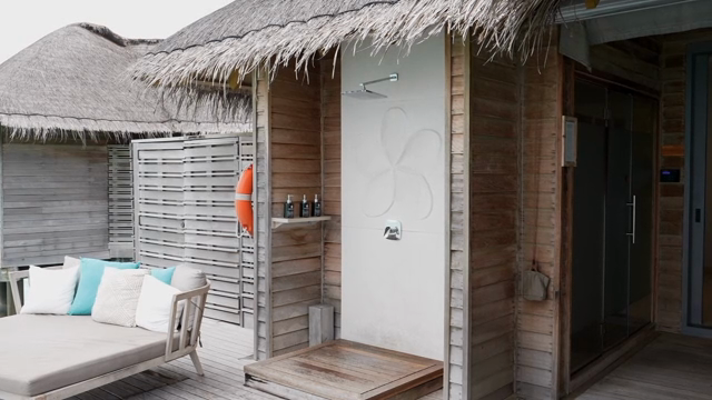 Outdoor shower area at a tropical resort