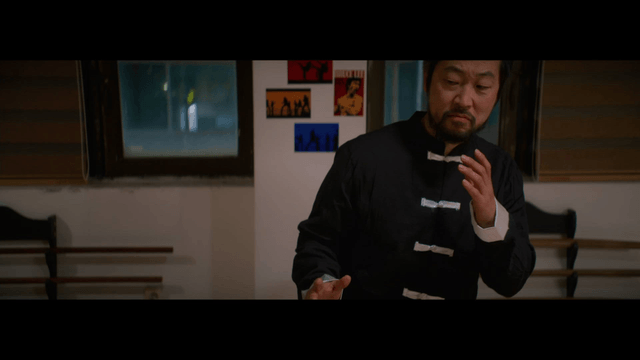 Traditional martial artist practicing indoors