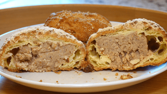 Cream-filled pastries on a plate
