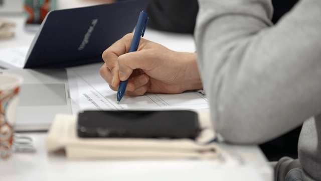 Person taking work-related notes