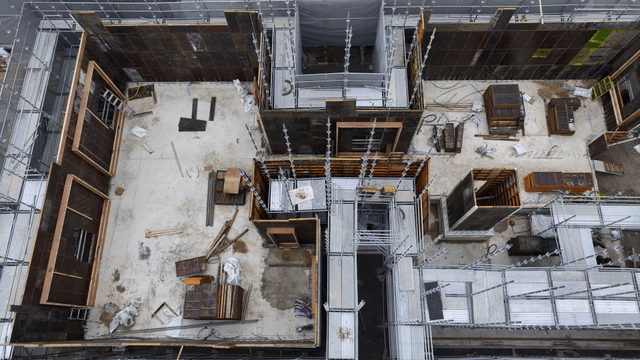 Construction site with scaffolding and materials