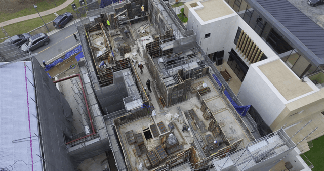 Construction workers building a structure