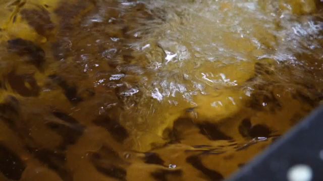 Deep frying a battered food item
