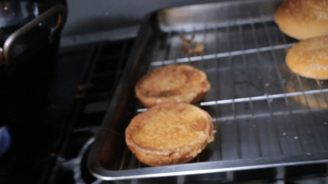 Taking out fried hamburger buns
