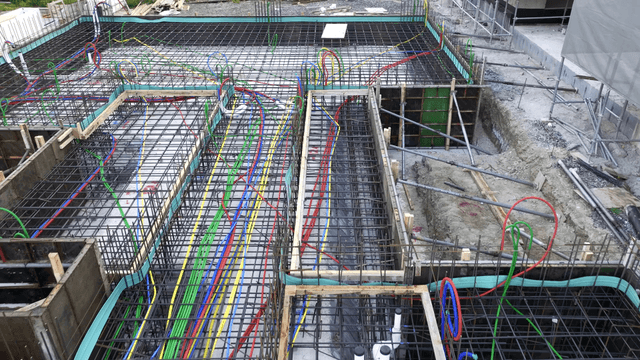 Construction site with colorful cables