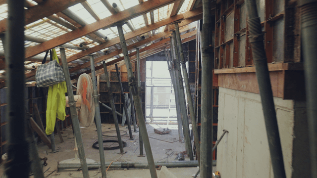 Inside a construction site with scaffolding