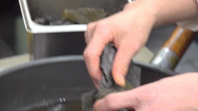 Preparing seaweed broth in a kitchen