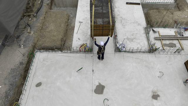 Construction site with a crane lifting materials