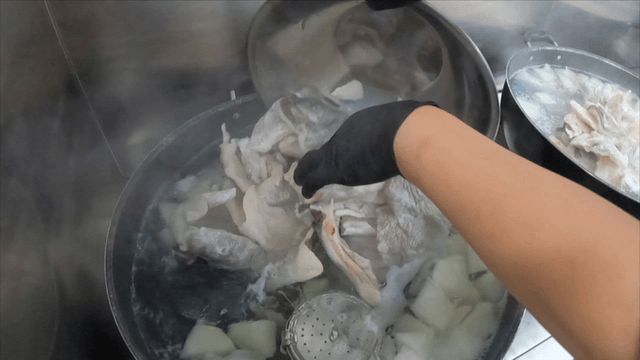 Cod added to boiling pot