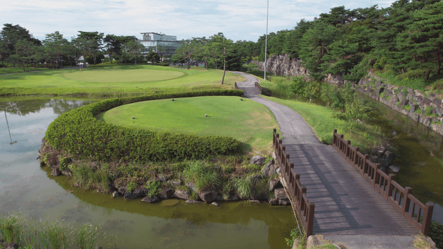 Aerial view of a lush green golf course