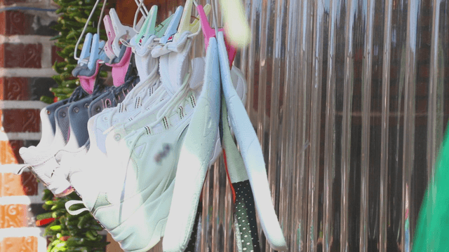 Shoes hanging outside to dry