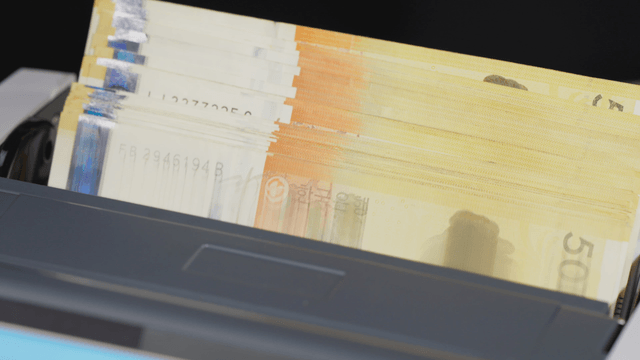 Korean banknotes in a counting machine