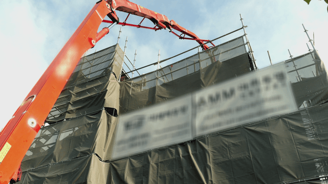 Construction site with crane and scaffolding