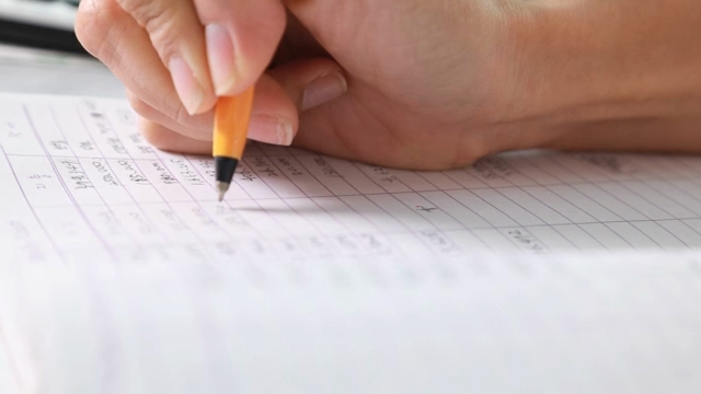Hand writing on a financial document
