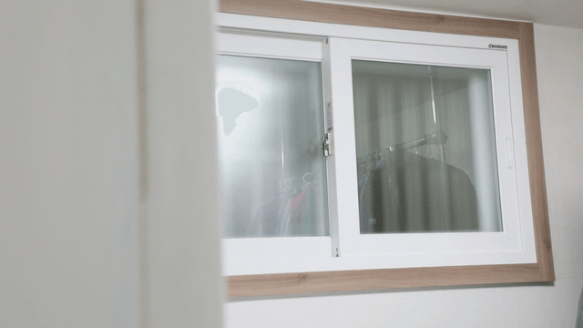 Wardrobeview with a window and clothes