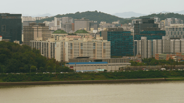 Seoul city skyline with Han River and forest