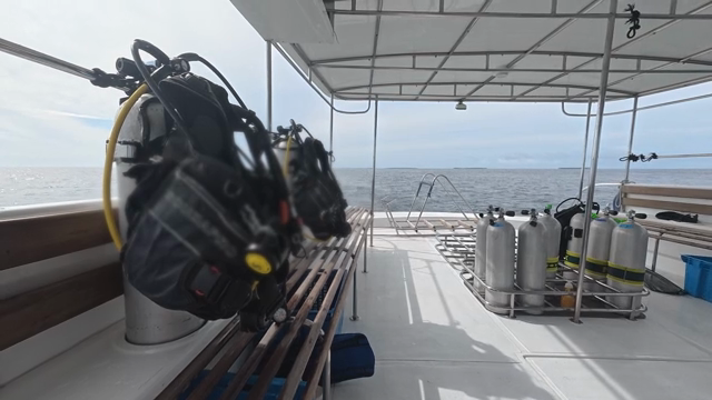Scuba diving equipment on a boat deck