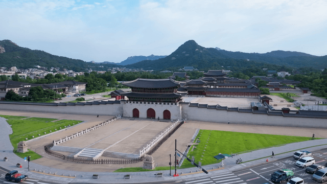 Historic palace with surrounding mountains