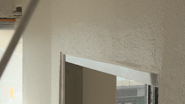 Roller brush painting on a wall