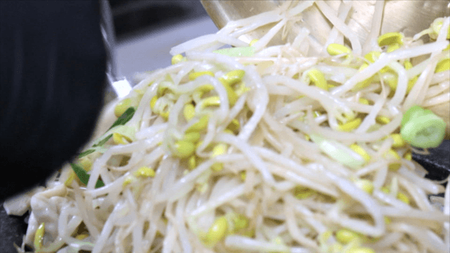 Bean sprouts placed on braised cod