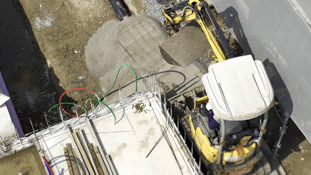 Excavator operating at a construction site