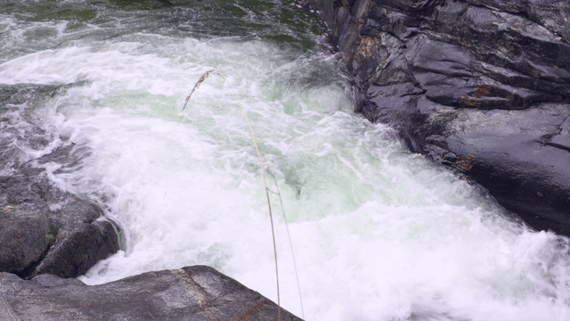 Rushing water over rocky terrain