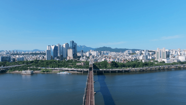 Cityscape with long bridge over Han River