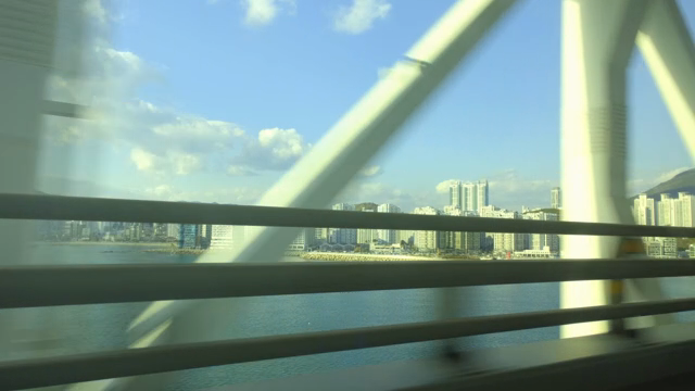 Car driving on a bridge over the sea