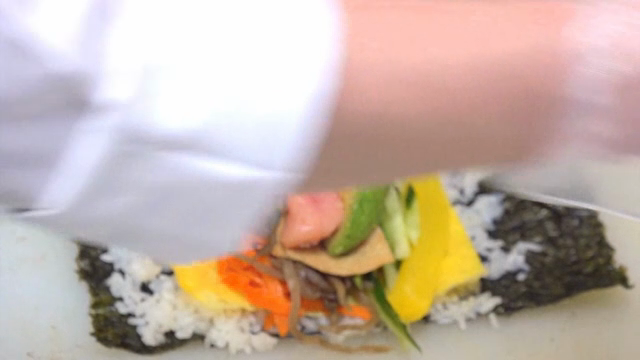 Preparing gimbap with various ingredients