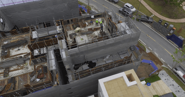 Construction workers building a structure