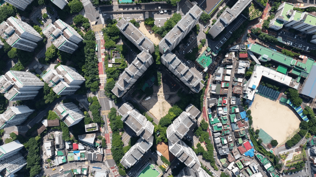 Aerial view of a city with tall buildings