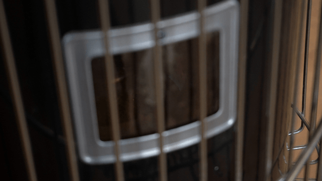Close-up of a heating heater with visible flames