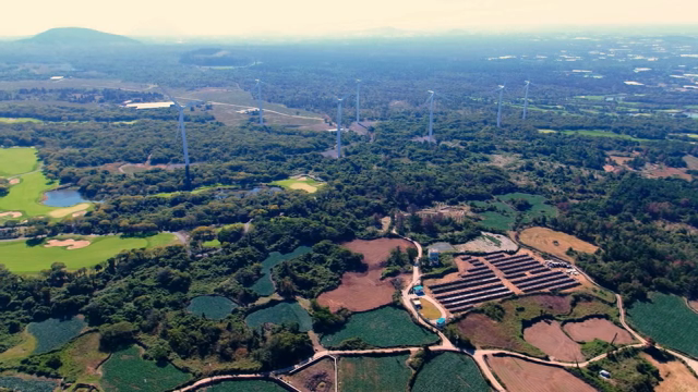 Expansive landscape with wind turbines