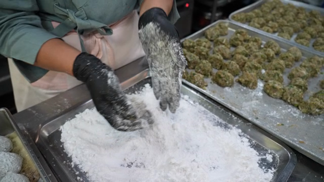 Coating dumpling filling with flour