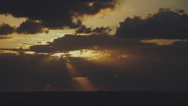 Sunset with dramatic clouds over the sea