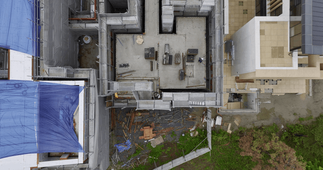 Construction site with scaffolding and workers