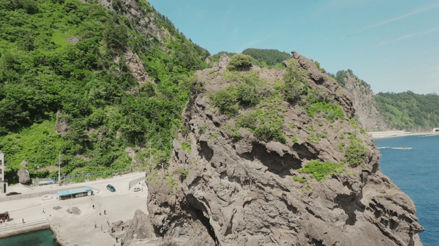 Coastal cliffs and blue ocean view