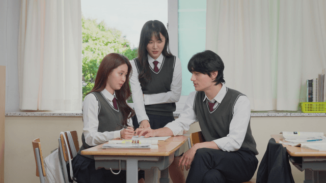 Students chatting together in the classroom