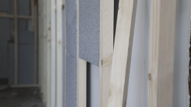 Wooden frames and insulation in a building
