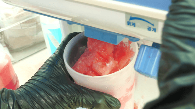 Refreshing watermelon cup bingsu being finely shaved