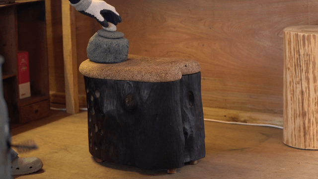 Wooden chair with stone and cork top