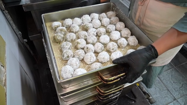 Dough balls prepared on a steamer