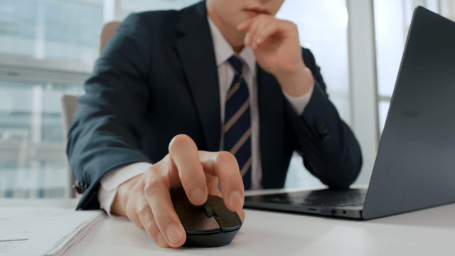 Businessman working on a laptop in an office