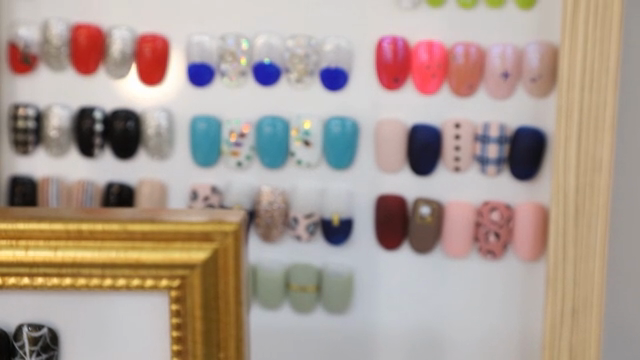 Various nail art designs displayed