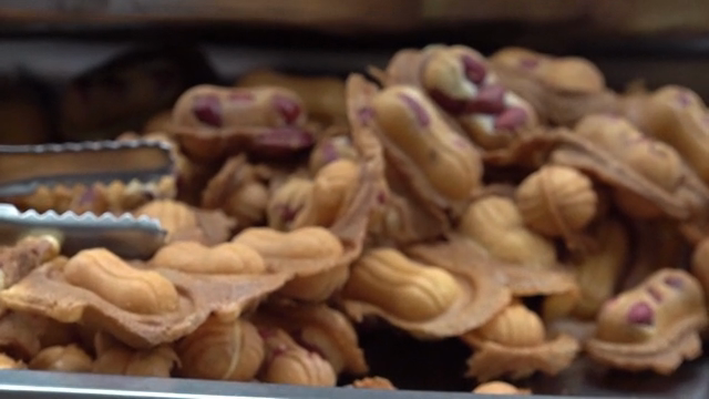 Freshly baked peanut-shaped bread
