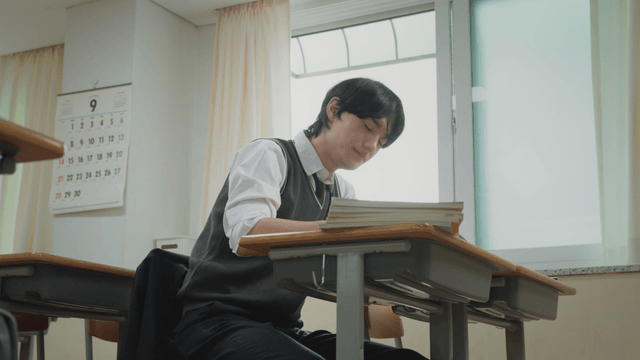 Student feeling tired in a classroom